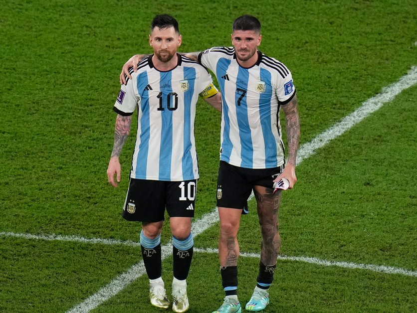 Lionel Messi a Rodrigo de Paul.